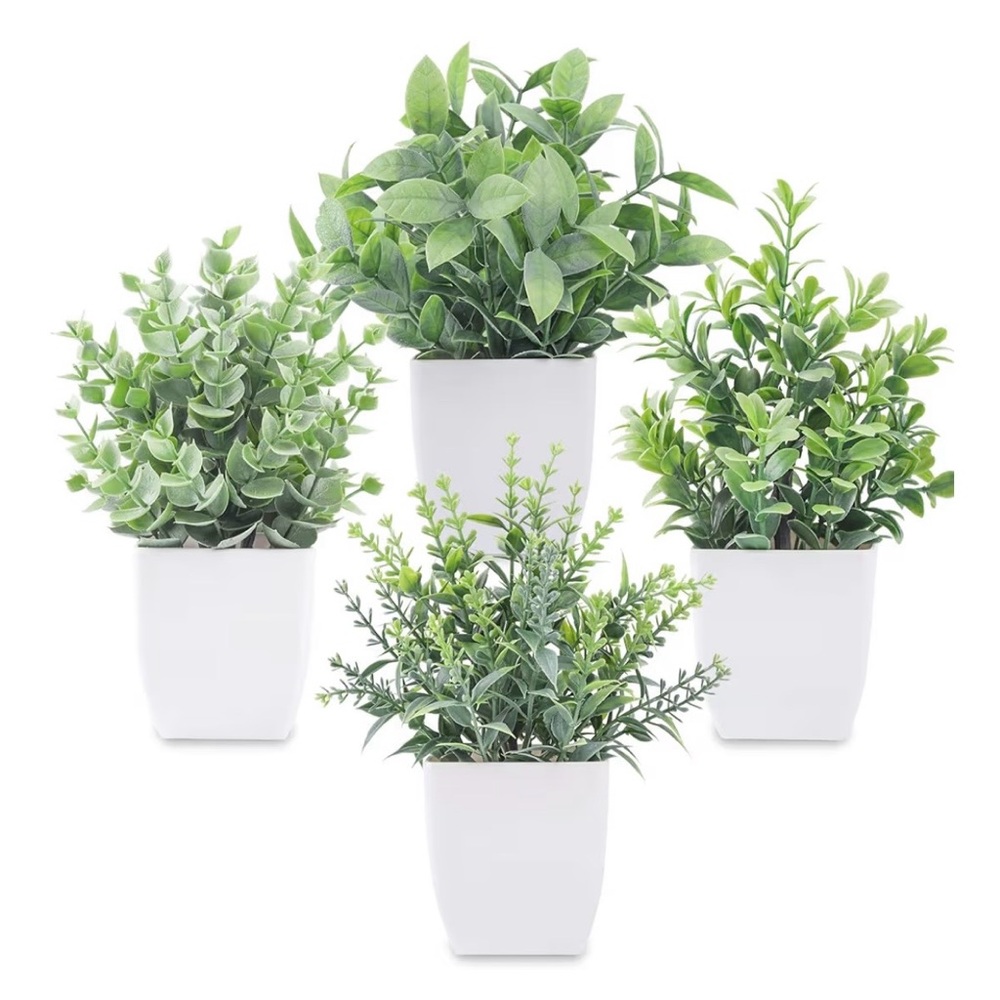 Set of Four Potted faux greens in White Pots